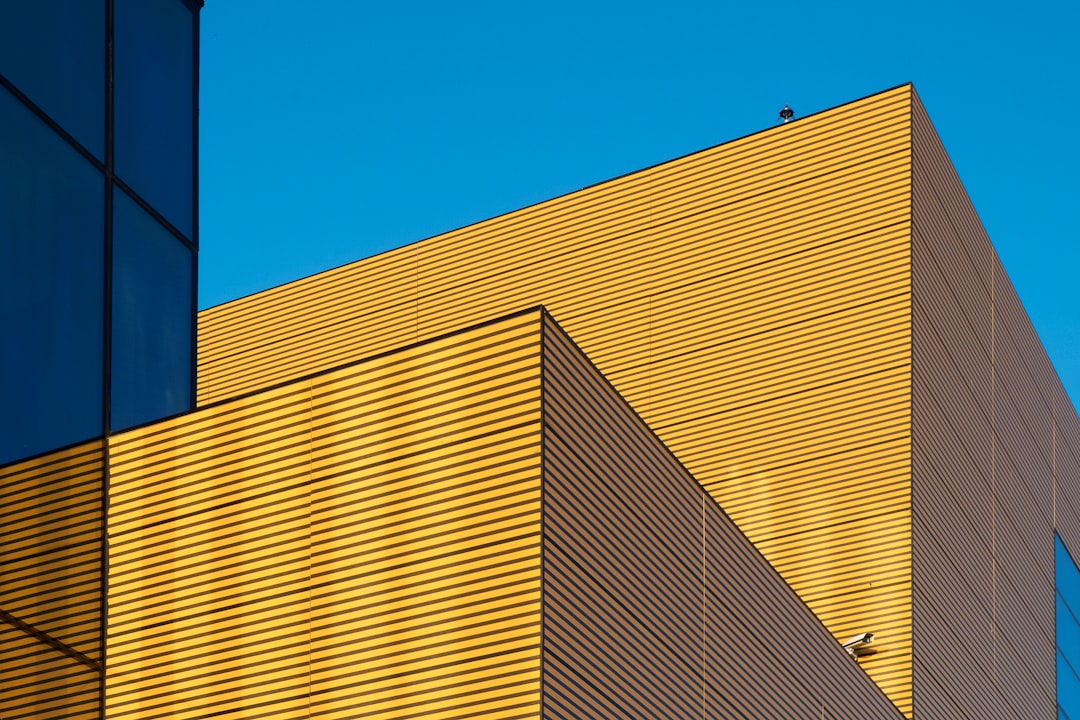 yellow building under clear blue sky during daytime